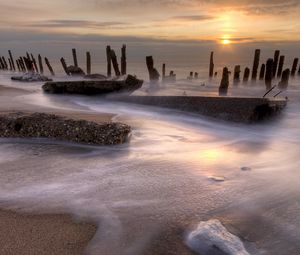 Preview wallpaper stakes, coast, foam, decline