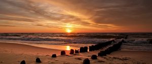 Preview wallpaper stakes, decline, sea, water