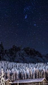 Preview wallpaper starry sky, barn, building, mountains
