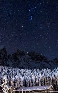 Preview wallpaper starry sky, barn, building, mountains