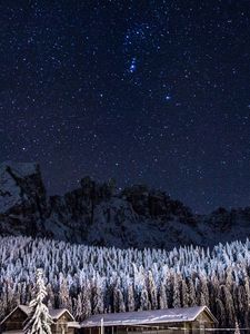 Preview wallpaper starry sky, barn, building, mountains