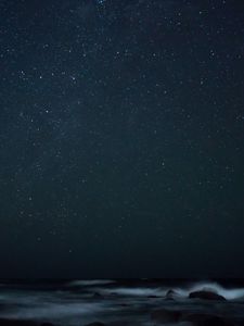 Preview wallpaper starry sky, fog, rocks, sea