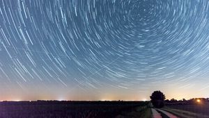 Preview wallpaper starry sky, freezelight, road, tree