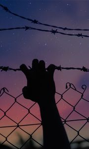 Preview wallpaper starry sky, hand, barbed wire, fence, freedom, night