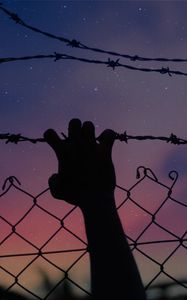 Preview wallpaper starry sky, hand, barbed wire, fence, freedom, night