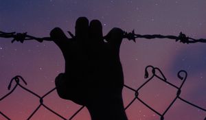 Preview wallpaper starry sky, hand, barbed wire, fence, freedom, night