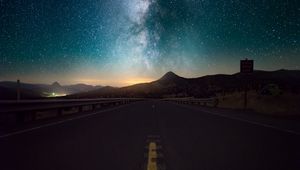 Preview wallpaper starry sky, horizon, night, road