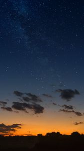 Preview wallpaper starry sky, horizon, sunset, night, clouds, landscape