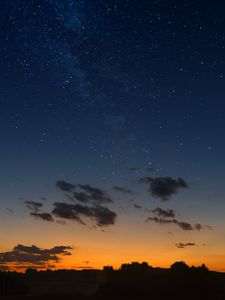 Preview wallpaper starry sky, horizon, sunset, night, clouds, landscape