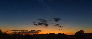 Preview wallpaper starry sky, horizon, sunset, night, clouds, landscape