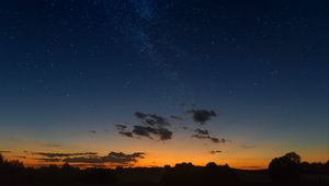 Preview wallpaper starry sky, horizon, sunset, night, clouds, landscape