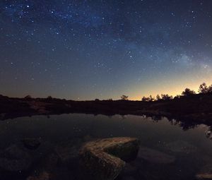 Preview wallpaper starry sky, lake, night, horizon, reflection