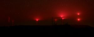 Preview wallpaper starry sky, lights, light, fog, red, dark