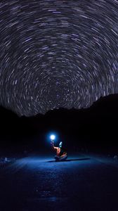 Preview wallpaper starry sky, man, night, light, road