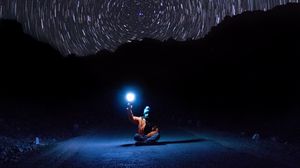 Preview wallpaper starry sky, man, night, light, road