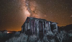 Preview wallpaper starry sky, milky way, building, night, june lake, united states