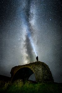 Preview wallpaper starry sky, milky way, man, silhouette, hill, sky, night