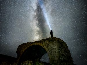 Preview wallpaper starry sky, milky way, man, silhouette, hill, sky, night