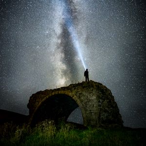 Preview wallpaper starry sky, milky way, man, silhouette, hill, sky, night