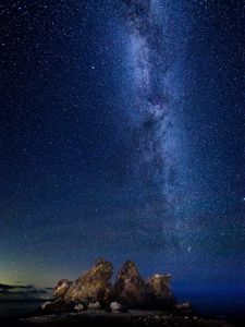 Preview wallpaper starry sky, milky way, stars, rocks