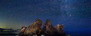 Preview wallpaper starry sky, milky way, stars, rocks
