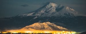 Preview wallpaper starry sky, mountain, snowy, night