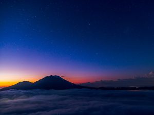 Preview wallpaper starry sky, mountains, clouds, night