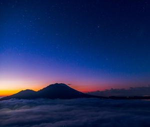 Preview wallpaper starry sky, mountains, clouds, night