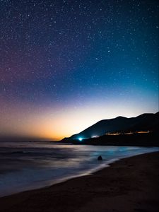 Preview wallpaper starry sky, mountains, night, sea, stars, shore