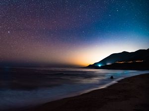 Preview wallpaper starry sky, mountains, night, sea, stars, shore