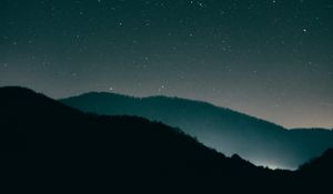 Preview wallpaper starry sky, mountains, night, radiance