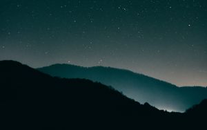 Preview wallpaper starry sky, mountains, night, radiance