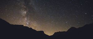 Preview wallpaper starry sky, mountains, radiance