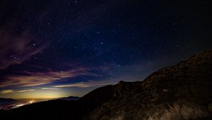 Preview wallpaper starry sky, mountains, stars, night