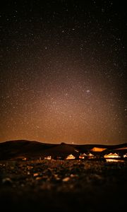 Preview wallpaper starry sky, night, buildings, hills, dark