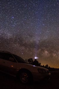 Preview wallpaper starry sky, night, car, glitter