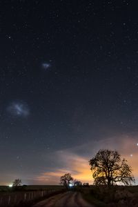 Preview wallpaper starry sky, night, path, field