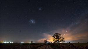 Preview wallpaper starry sky, night, path, field