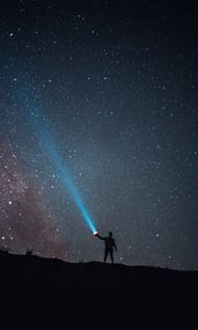 Preview wallpaper starry sky, night, silhouette, light, flashlight