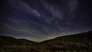 Preview wallpaper starry sky, night, starry landscape, radiance, hills