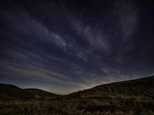 Preview wallpaper starry sky, night, starry landscape, radiance, hills