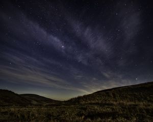 Preview wallpaper starry sky, night, starry landscape, radiance, hills