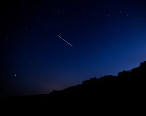 Preview wallpaper starry sky, night, stars, fall, trees, darkness