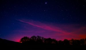 Preview wallpaper starry sky, night, trees, clouds