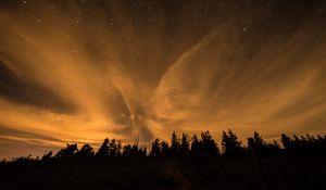 Preview wallpaper starry sky, night, trees, clouds, dark, shine, stars