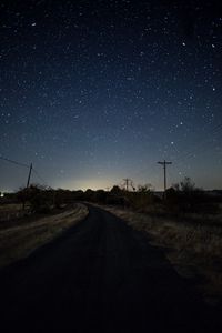 Preview wallpaper starry sky, night, turn, road, marking