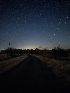 Preview wallpaper starry sky, night, turn, road, marking