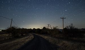 Preview wallpaper starry sky, night, turn, road, marking