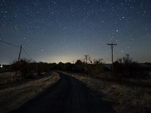 Preview wallpaper starry sky, night, turn, road, marking