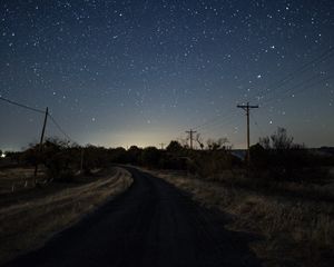 Preview wallpaper starry sky, night, turn, road, marking